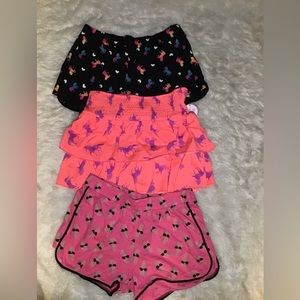 Justice 3 sets of shorts sizes (shorts 18/20) (skirt 14/16)